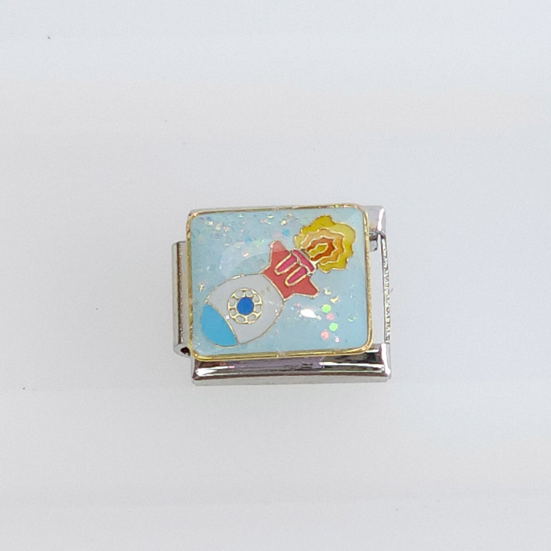 Charm Cohete Despegando