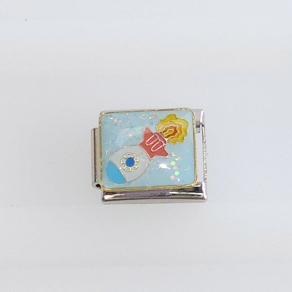 Charm Cohete Despegando