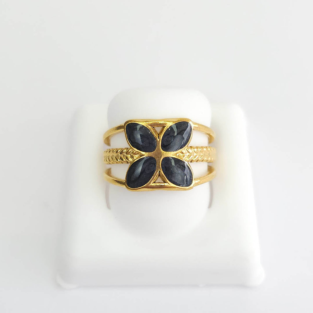 Anillo triple con flor azul 