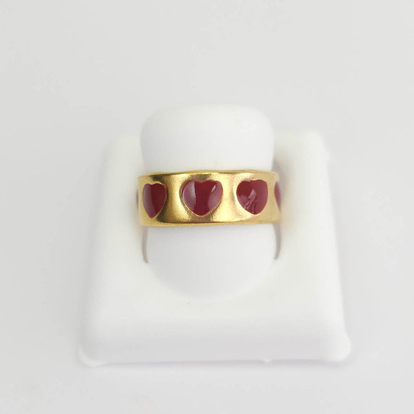 Anillo con corazones rojos
