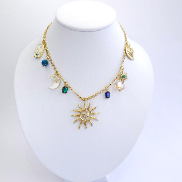 Collar con dijes sol, luna flor y zirconias