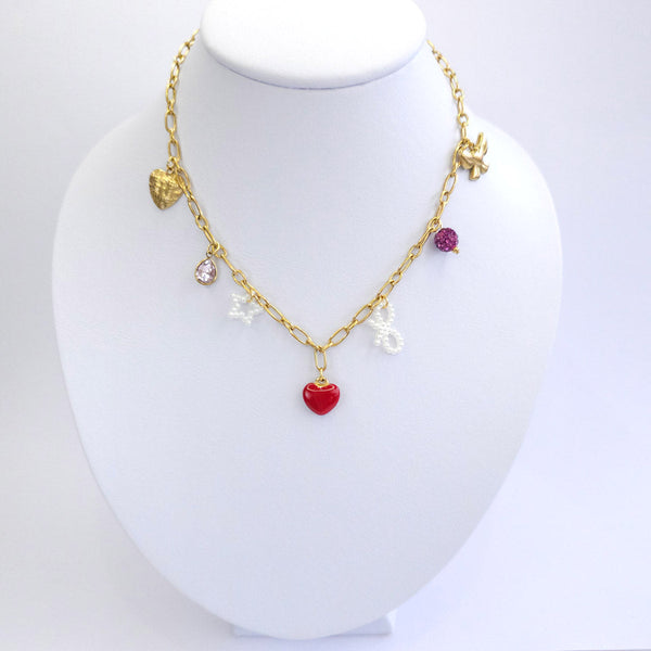 Collar con dijes corazón, moños perlas y zirconias