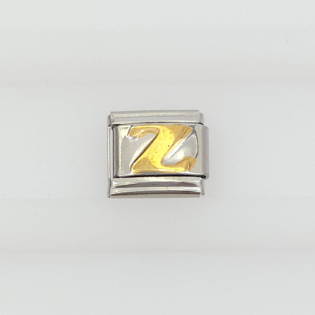 Charm Inicial Dorada 