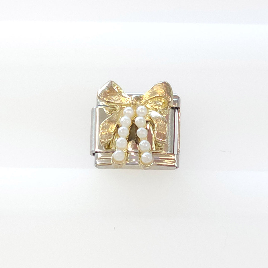 Charm Moño y bolitas