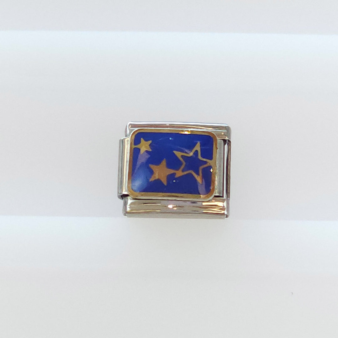 Charm Estrellas Azul y Dorado